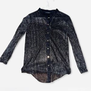 Womans long sleeve black and silver blouse